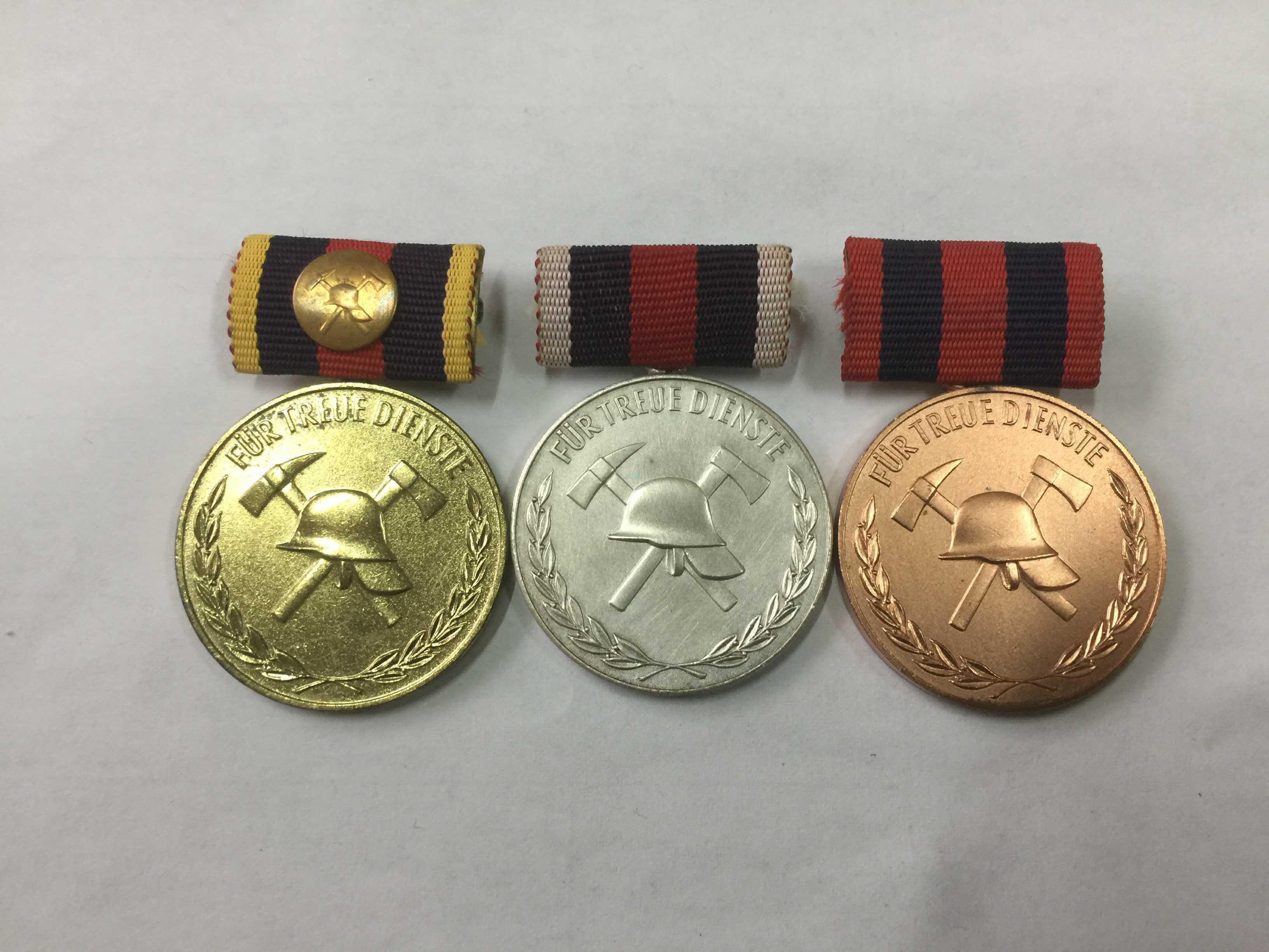 Set of firefighting medals of the GDR GDR East Germany