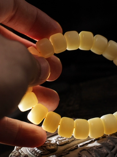 Браслет, четки из круглых бусин из грецкого ореха