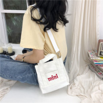 2020 new canvas bag womens shoulder college student Korean version of the simple Harajuku ins portable oblique cross small shopping bag