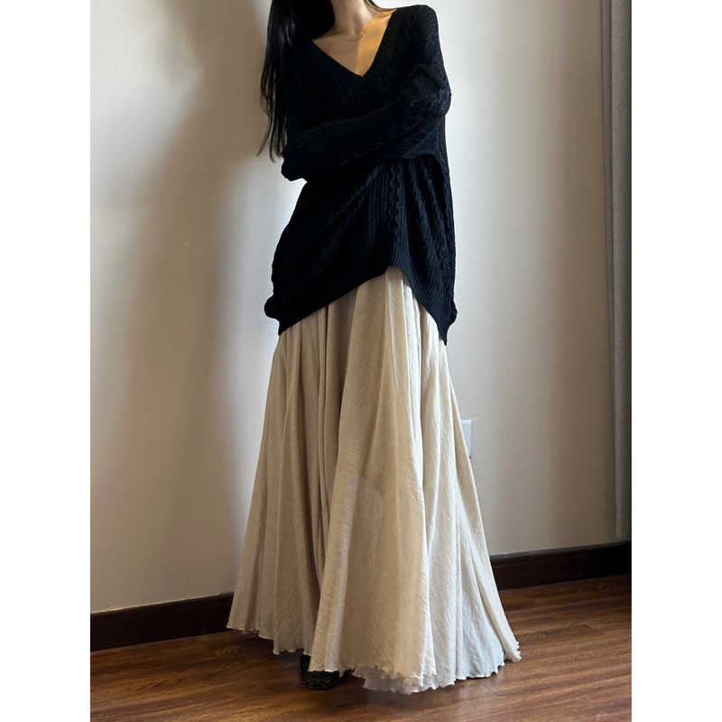 Elegant Apricot-Colored Cotton and Linen Midi Skirt with a High Waist, Long Length, Large Flared Hem, and Zen-Inspired A-Line Silhouette Elegant Apricot-Colored Cotton and Linen Midi Skirt with a High Waist, Long Length, Large Flared Hem, and Zen-Inspired A-Line Silhouette