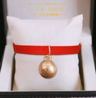 Бронзовый колокольчик, браслет из красной нити