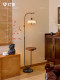 Water Drop Floor Lamp Next to the Sofa in the Living Room, High-End Walnut Color Storage Rack Integrated Side Table, Bedroom Ambient Light