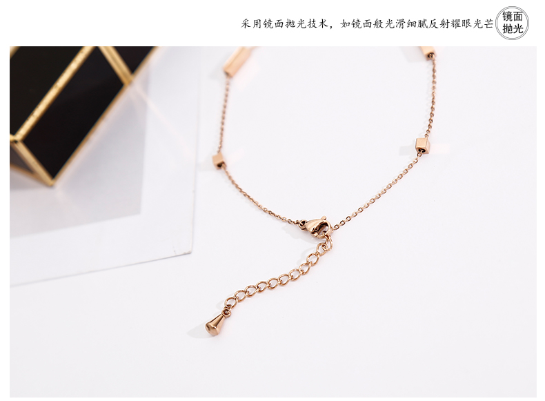 Han Jing vòng chân vàng hồng gợi cảm của phụ nữ hai màu đen trắng với một vòng trang sức vòng chân châu Âu và Mỹ lắc chân vàng