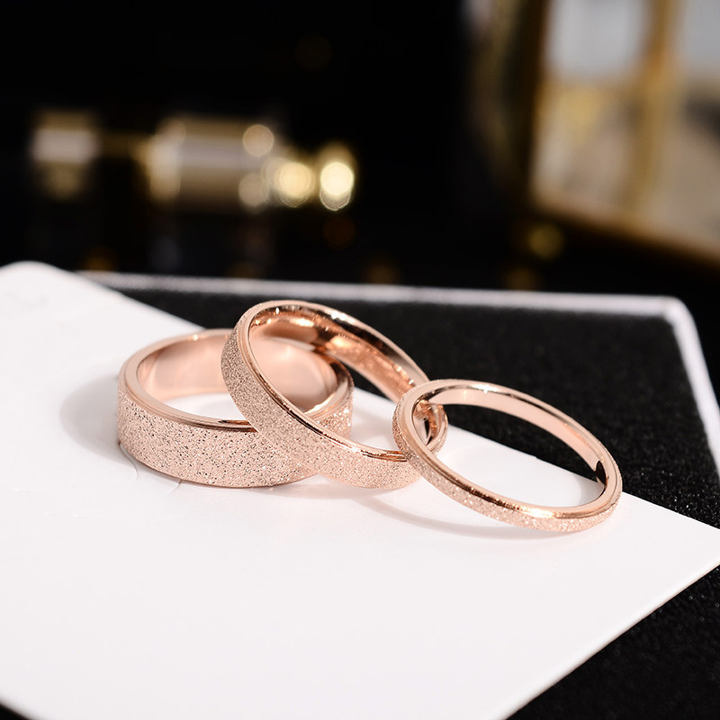 Han Kyohan version of titanium steel plated rose gold frosted lovers ring male and female to the ring finger ring small finger tail ring no fade