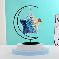 Лунная подставка + пустая пятизвездочная бутылка (в бутылке нет звезд) и бесплатные светящиеся наклейки.