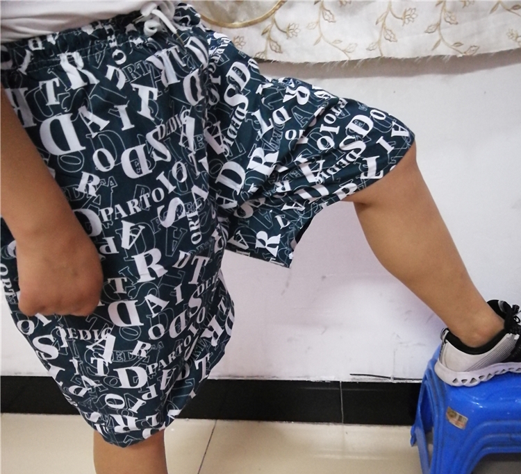Trẻ và trung niên màu xanh bãi biển quần người đàn ông lỏng mùa hè phần mỏng thường năm điểm quần short kích thước lớn nhanh chóng làm khô polyester 	quần đi biển bé trai