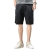 KM nam 2019 hè mới port gió cá tính thể thao lỏng lẻo năm quần đen hoang dã quần short nam - Quần short quần áo nam cao cấp Quần short