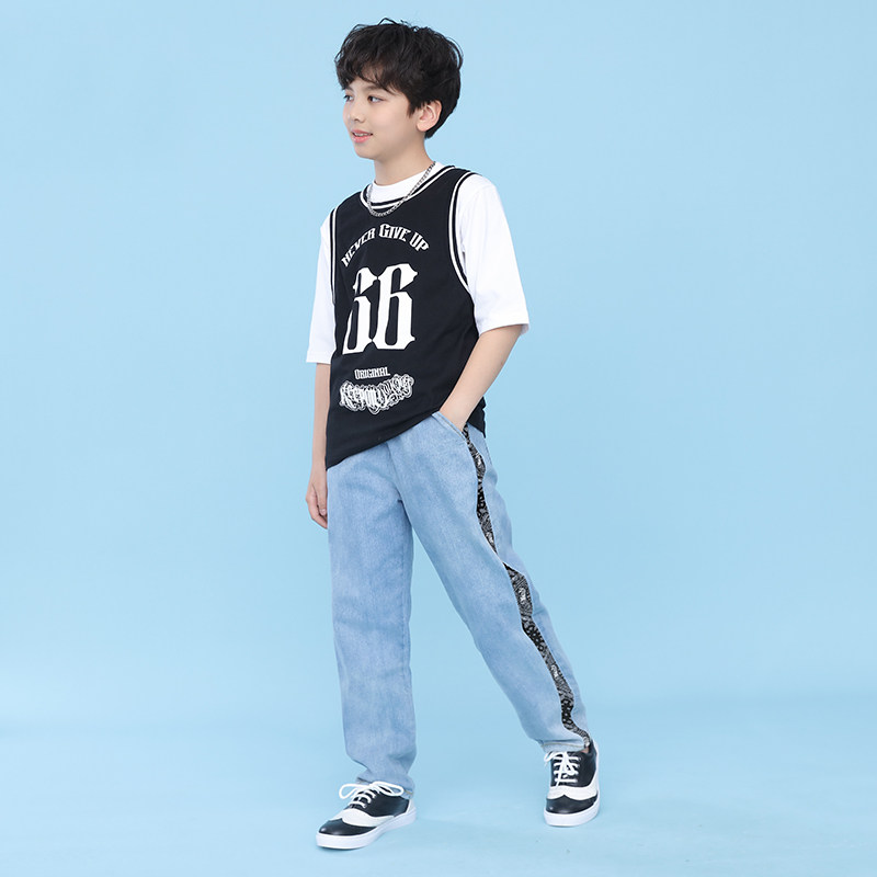 Young child popping boy short sleeve T-shirt jeans