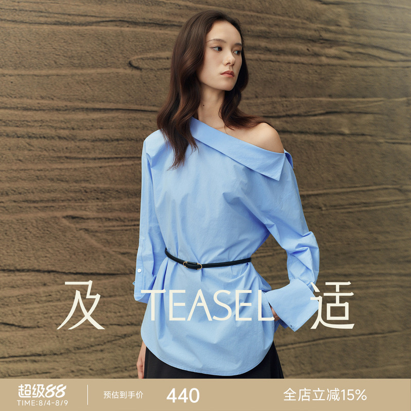 Teasel's "Free to Leave Blank Space in Your Life" Offers a Stylish Commuter Shirt with a Long Velvet Cotton Fold-Over Boat Neck Design and an Asymmetrical Shoulder Teasel's "Free to Leave Blank Space in Your Life" Offers a Stylish Commuter Shirt with a Long Velvet Cotton Fold-Over Boat Neck Design and an Asymmetrical Shoulder