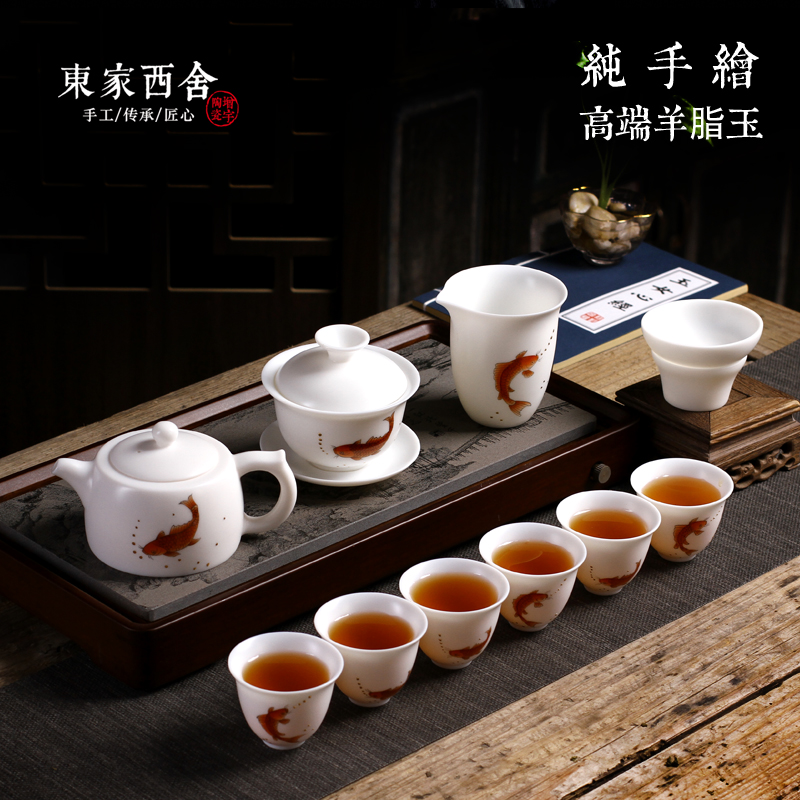 Dehua white porcelain tea set group year with fish hand - covered cup teapot 6 people Kung fu teacup amniotic ceramic gift