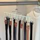 Belt storage artifact multi-function rack