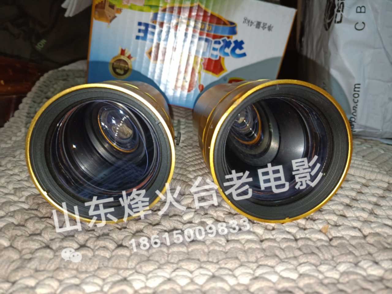 35mm old machine-parts landline with one wide-screen camera lens through normal use