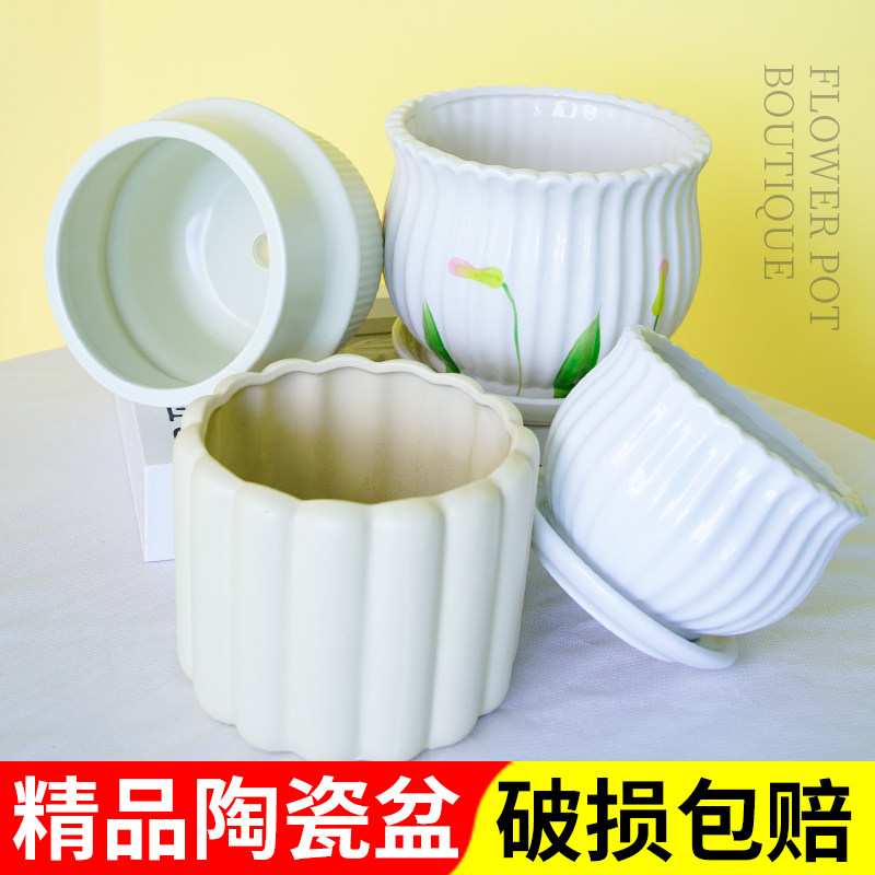 Clearance sale of large ceramic flowerpots with trays, new household simple and light luxury succulent green plant flowerpots wholesale
