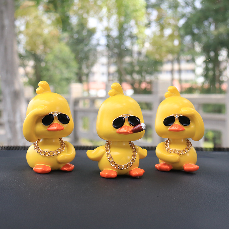 Little yellow duck car decoration shaking sound with the same net red car interior products Car decoration car interior supplies Car shaking head doll