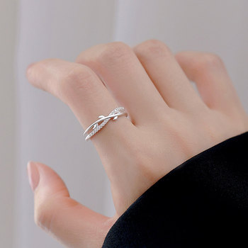 Adjustable index finger ring with bud ring opening
