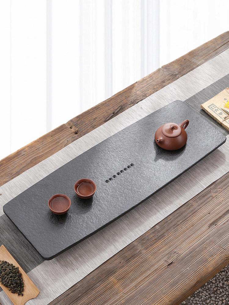 Black gold stone tea tray Household simple natural stone Black gold stone tray Dry bubble table Fire stone office tea table