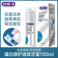 Шустерская жидкость нажимает зубную пасту, чтобы удалить зубную зубную прочность.