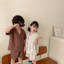 Childrens summer clothes comfortable linen lapel suit suit boys and girls solid color Korean style short-sleeved shorts two-piece set