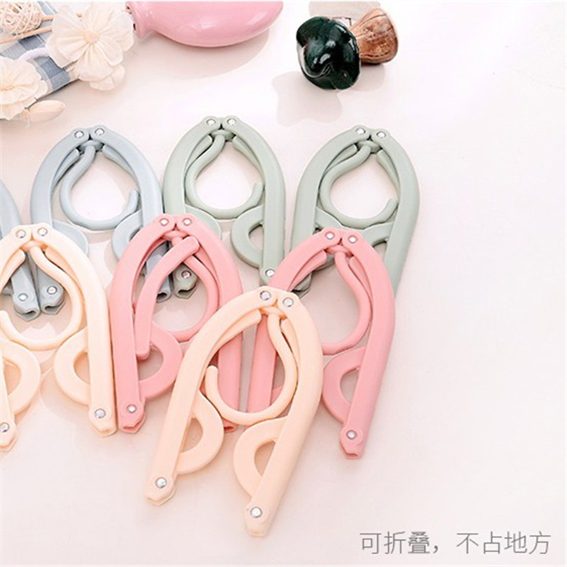 Versatile travel folding clothes hanger containing clothes hanger portable tourist deviner for business home clothes hangover folding