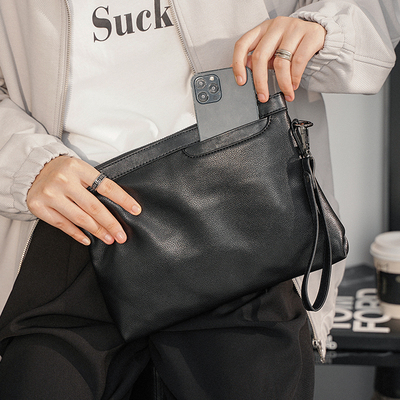 Hong Kong IT Catherine's new casual handbag headsleeve men and women on the street hands to carry bags