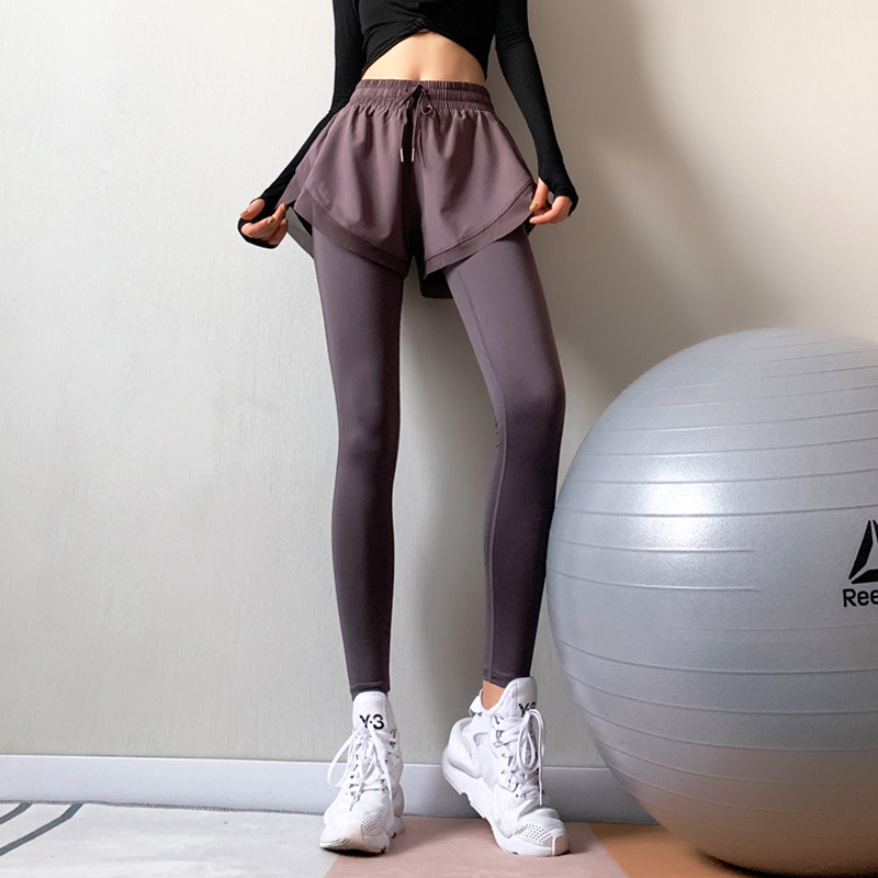 Arashi high waist stretch fake two pieces of fitness pants women's tight running pants skirt autumn and winter yoga sports show slender long pants