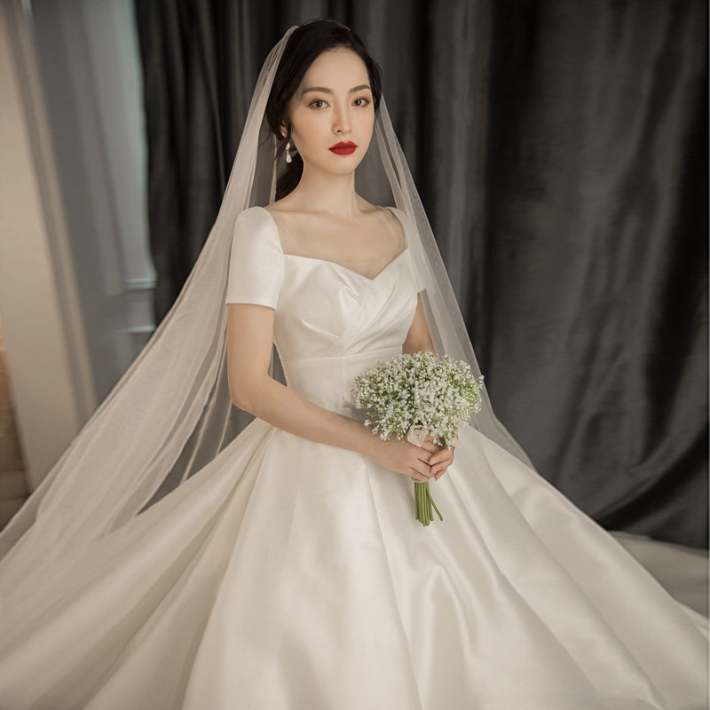 Satin wedding dresses 2022 new temperamental bridal style little sub minimis retro tug tail light and coarse arm