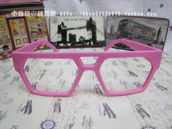 Màu sắc kẹo không đều hiện đại vui nhộn không có ống kính nam nữ áp dụng kính khung kính khung retro kính monster