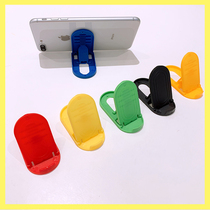 General-purpose mobile phone desktop lazy holder Apple multifunctional creative simple folding shelf simple portable small clip driving bedside watching TV live ring buckle plastic small support frame