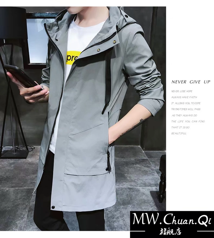 MWCQm01d Mùa thu Mới Hàn Quốc Slim Trend Nam Long Trench Coat Thanh niên Áo khoác trùm đầu - Áo gió thể thao