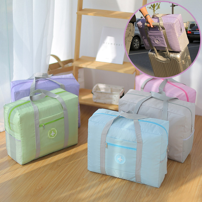 Travel bag Large capacity foldable portable clothing storage bag Women's luggage bag Men's plane business hand boarding bag