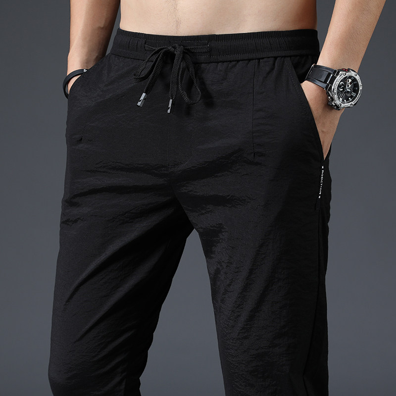 Summer thin men's casual pants slim feet ice silk men's pants Korean fashion summer pants men's quick-drying sports pants