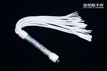 The flow of a colourful nine-tailed umbrella rope flogging