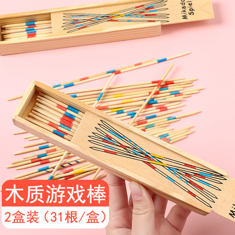 Children pick up a stick and pick up a fancy little toy baseball game stick pick and pick a great desktop puzzle-like game
