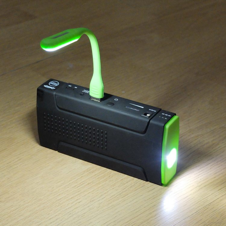 12V car emergency start power supply portable charging treasure polymer lithium battery with flashlight table lamp