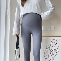 Early autumn gestational woman with large elastic high waist yoga pants tobellied shark pants minimalist about 100 lap fashion underpants