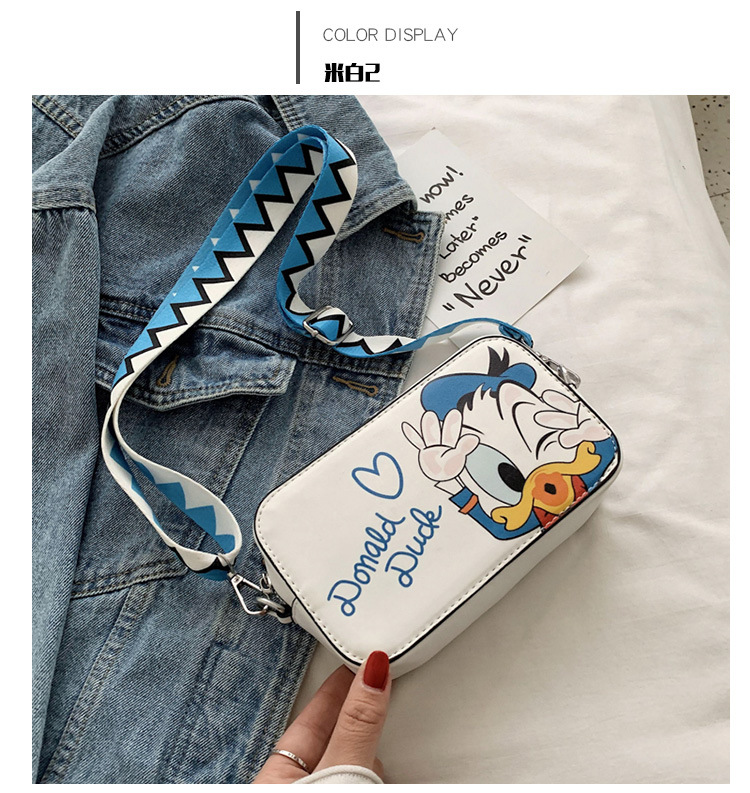 Donald Duck Horizontal Rice WhiteDonald Duck Inclined shoulder bag lovely Mickey girl Put the phone Small bag Wide shoulder strap Vertical section student Lipstick Small square bag
