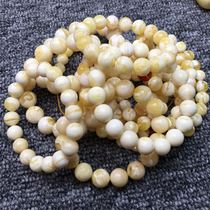 Small cinnamon beeswax natural Russian white flower chicken oil yellow beeswax single circle bead bracelet 108 beads to make up the difference link