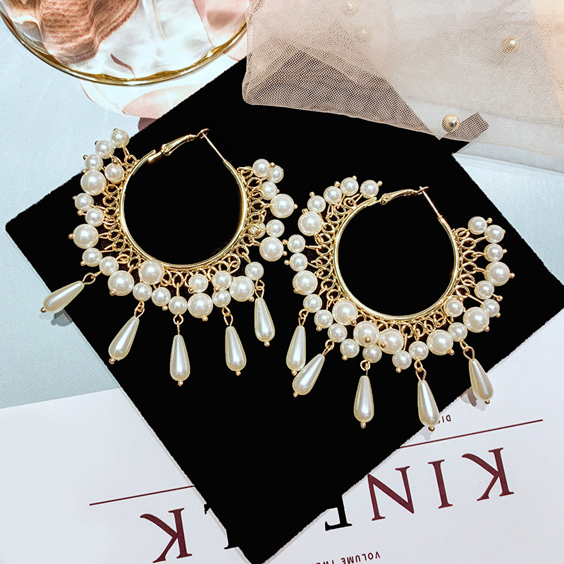 YJ Europe and the United States new personality exaggerated long version of temperament pearl earrings fashion very fairy retro thin earrings female