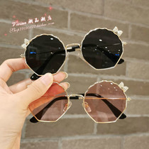 Hong Kong children sunglasses male and female anti-UV sunglasses cute butterfly knot little girl shells glasses