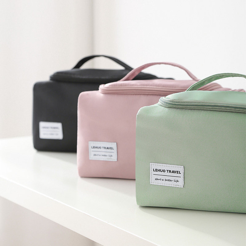 Makeup bag female portable 2023 new super fire super high - sense minimal tide travel large capacity waterproof wash collection bag