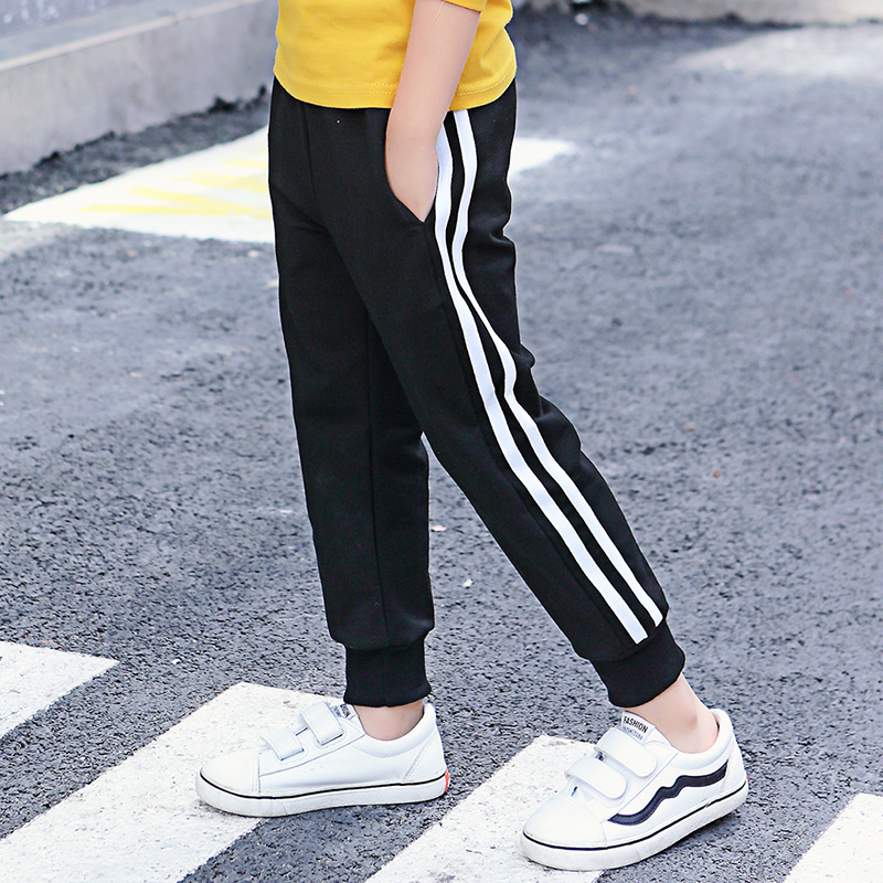 Chàng trai giản dị quần quần triều 2019 mùa xuân mới trẻ em vừa sweatpants xà cạp xà cạp childrens quần nhỏ chân.