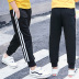 Chàng trai giản dị quần quần triều 2019 mùa xuân mới trẻ em vừa sweatpants xà cạp xà cạp childrens quần nhỏ chân. 