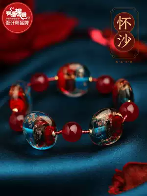 Phoenix Nirvana original hand female niche design hand jewelry crystal jewelry ethnic style retro golden sand glazed hand string