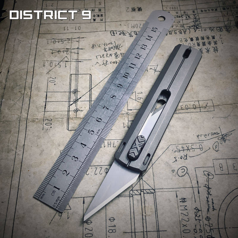 9th District Beauty cutter Three generations of titanium alloy portable Tactical version metal one-hand open and close carbon fiber EDC cutter