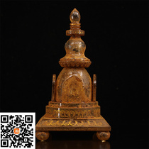 A treasure trove of a crystal gold-painted relic pagoda unearthed from the underground palace of an ancient Tibetan temple. It weighs 1906 grams and is 24 5 high.