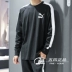 PUMA 彪 ngựa mùa thu nam và nữ dệt kim cổ tròn T7 khâu áo thun thể thao giản dị áo len dài tay 577589-01 Thể thao lông cừu / jumper