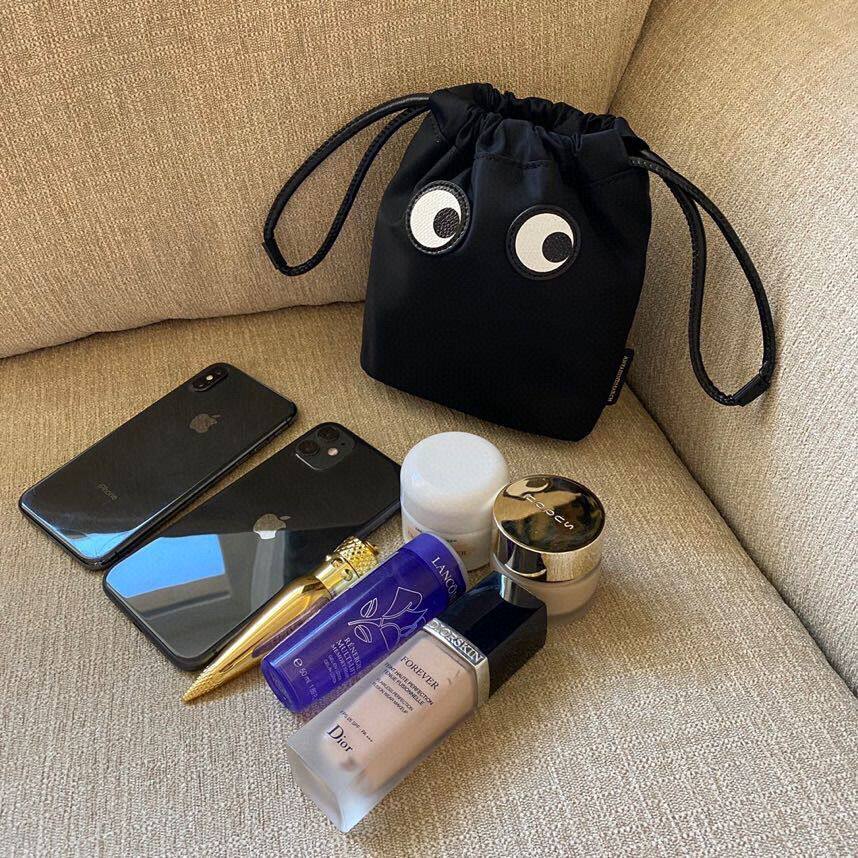 Spot hair welfare models big eyes waterproof nylon drawstring hand carry mini bag storage cosmetic bag