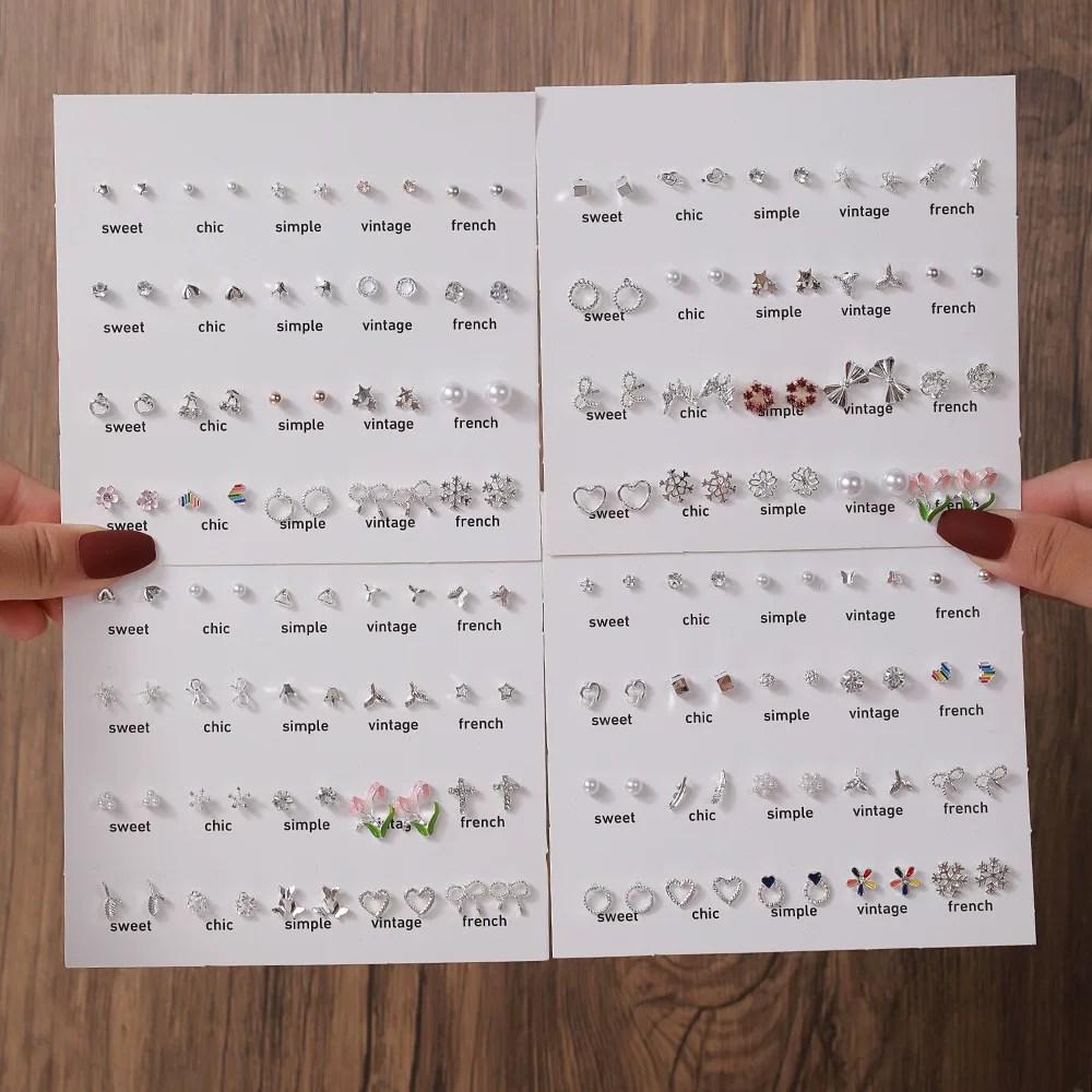 Small earrings from pearl, set, four-leaf clover