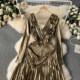 Classy golden dress, high-end light luxury, niche heavy industry, pleated long pleated skirt, sexy V-neck temperament dress