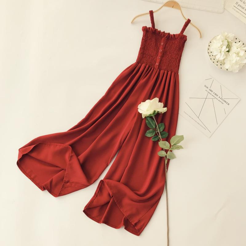 Váy dài bãi biển hè 2018 mới xếp li ống tai bằng gỗ trang trí nút cao eo thon cao chân rộng quai jumpsuit váy chiết eo cao	